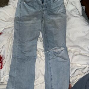 Distressed Light Blue Denim Jeans